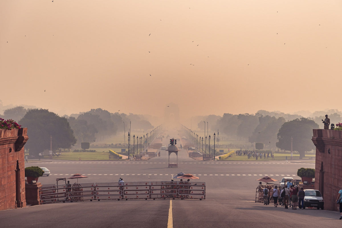India Gate in New Delhi reduced to a silhouette by thick winter smog over Kartavya Path
