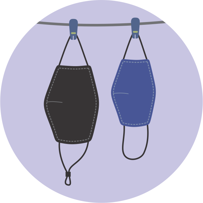Illustration of two reusable masks drying on a clothesline